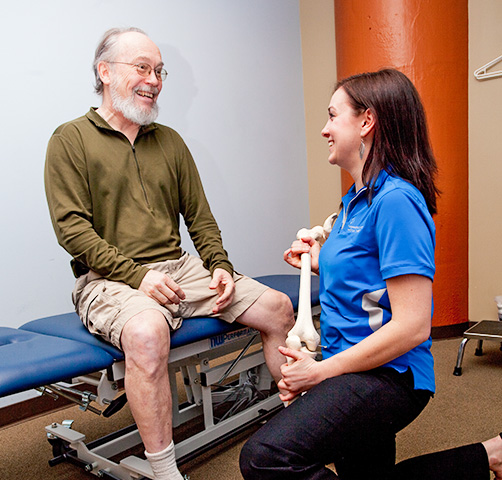 physical therapist and a patient