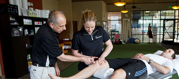 Physical therapist training younger therapist