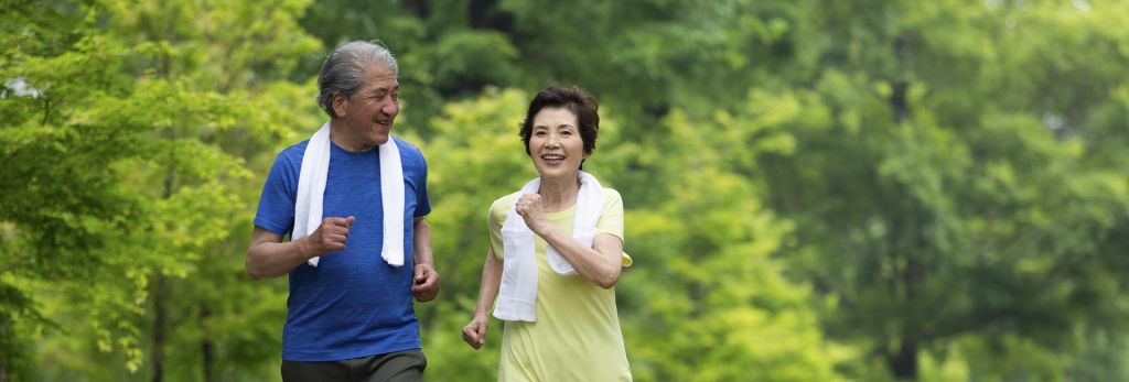 a couple out on a vigorous walk for exercise