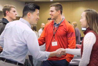 Physical therapists introduce each other at PT Cohort