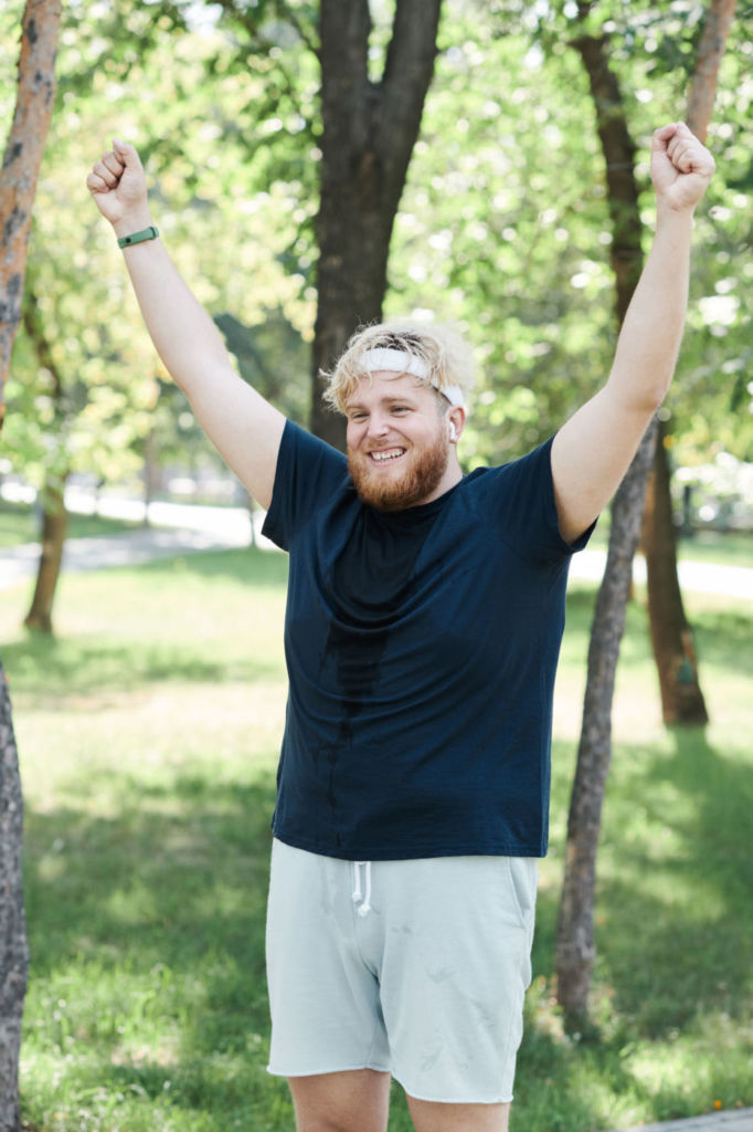 man celebrating exercise victory