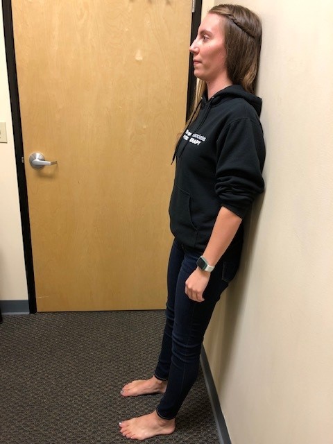 posture check against wall