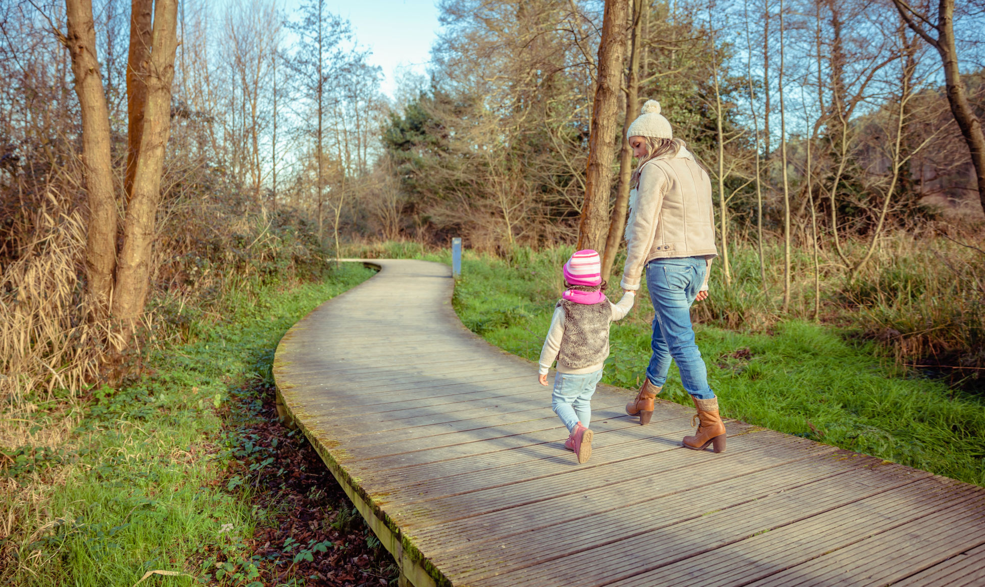 a mother and daughter on a walk outdoors