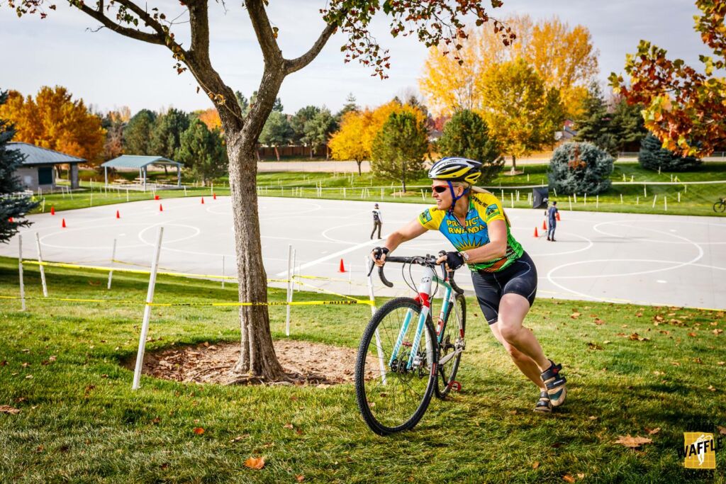 woman competing in cycle cross