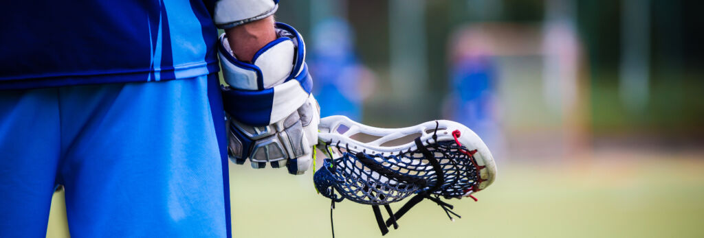 close up of lacrosse player's stick