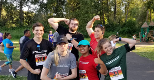a group of friends and coworkers during a running event