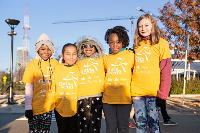 Girls on the Run media file shows a group of diverse girls at an event