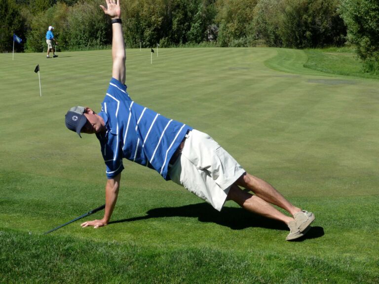 Side plank on the golf course