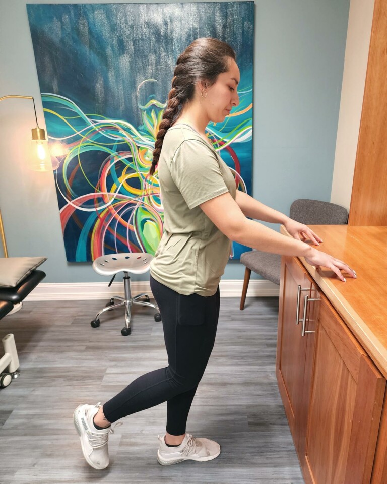Demonstration of single leg balance exercise