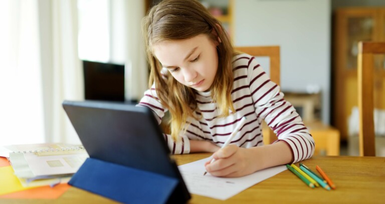 doing homework on a digital tablet creates challenges for safe ergonomics and proper posture