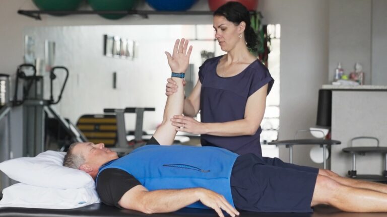 Physical therapist Mindy English assesses a patient's movement and mobility.