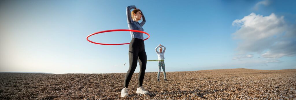 Hula hooping outdoors for exercise and fitness