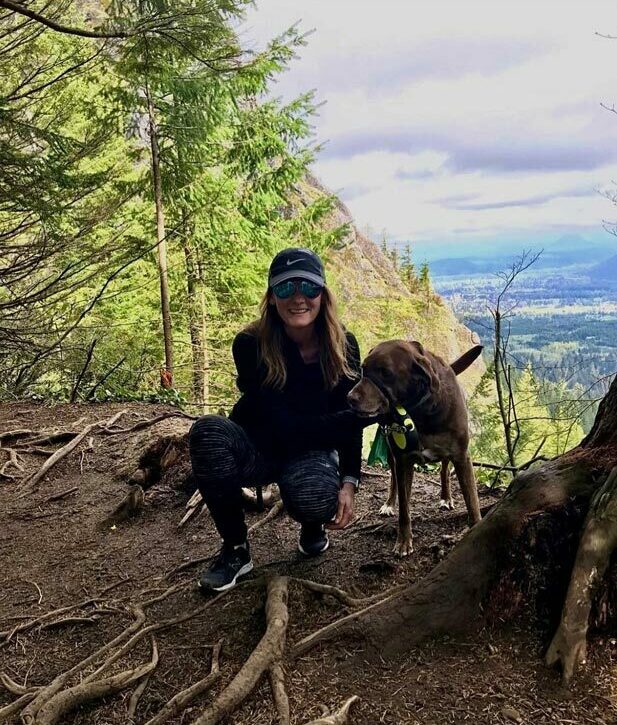 physical therapist Lisa Holden Jackson on a hike with her dog.
