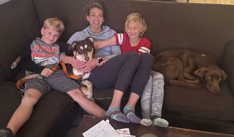 physical therapist with her kids and dog