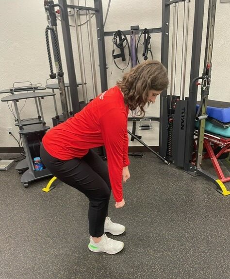 deadlift exercise motion using a proper hip hinge