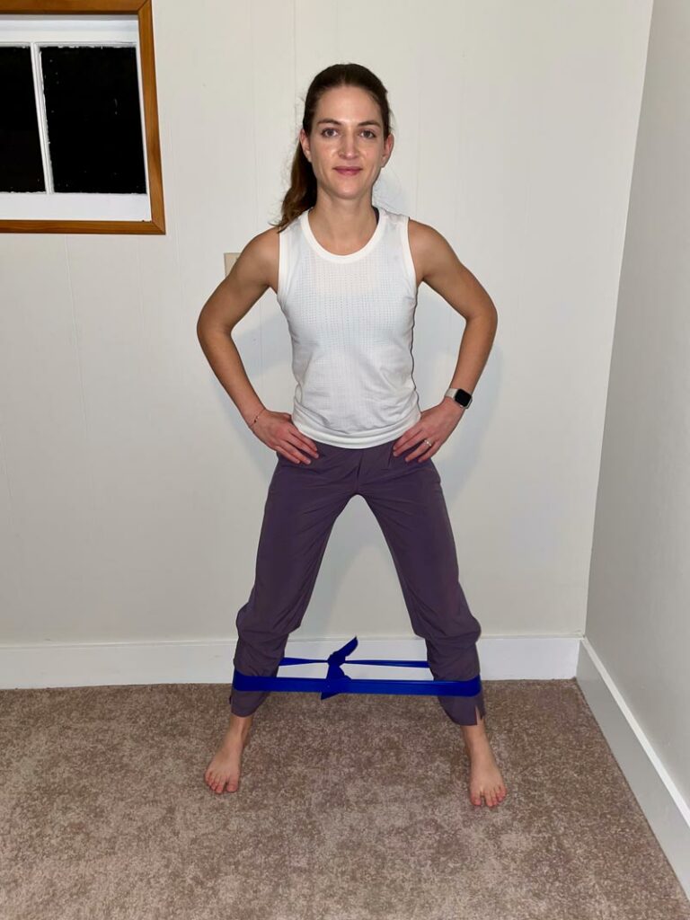 utilize a resistance band for a side step exercise to build hip strength to support balance