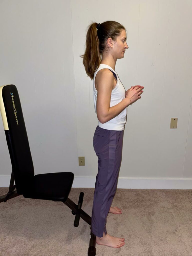 preparing to perform a squat exercise