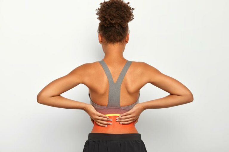 low back pain illustrated by red for hot for pain