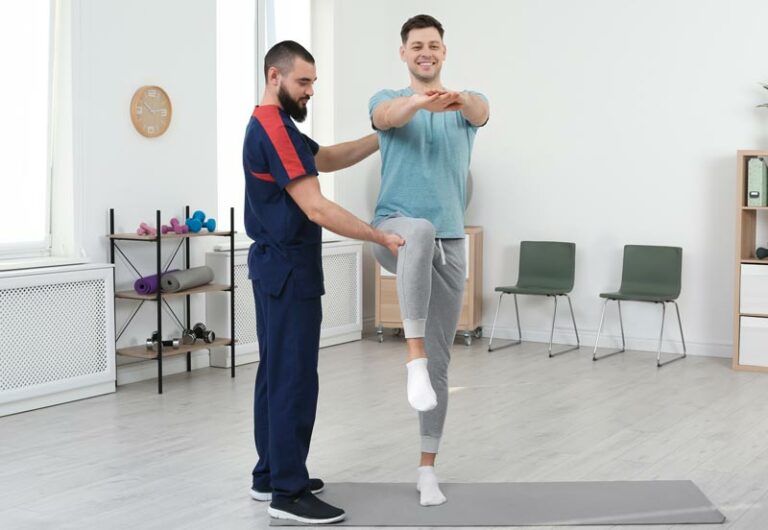 Physical therapist works with a patient on stability, mobility and pain relief