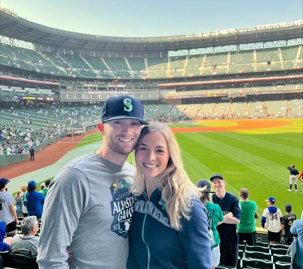 massage therapist Jocelyn Davis at a ball game with her husband